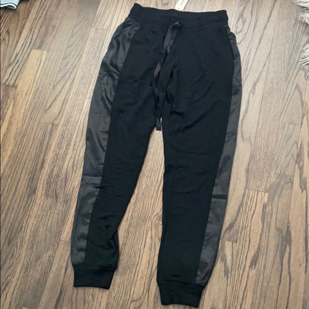 Garage. Black joggers.